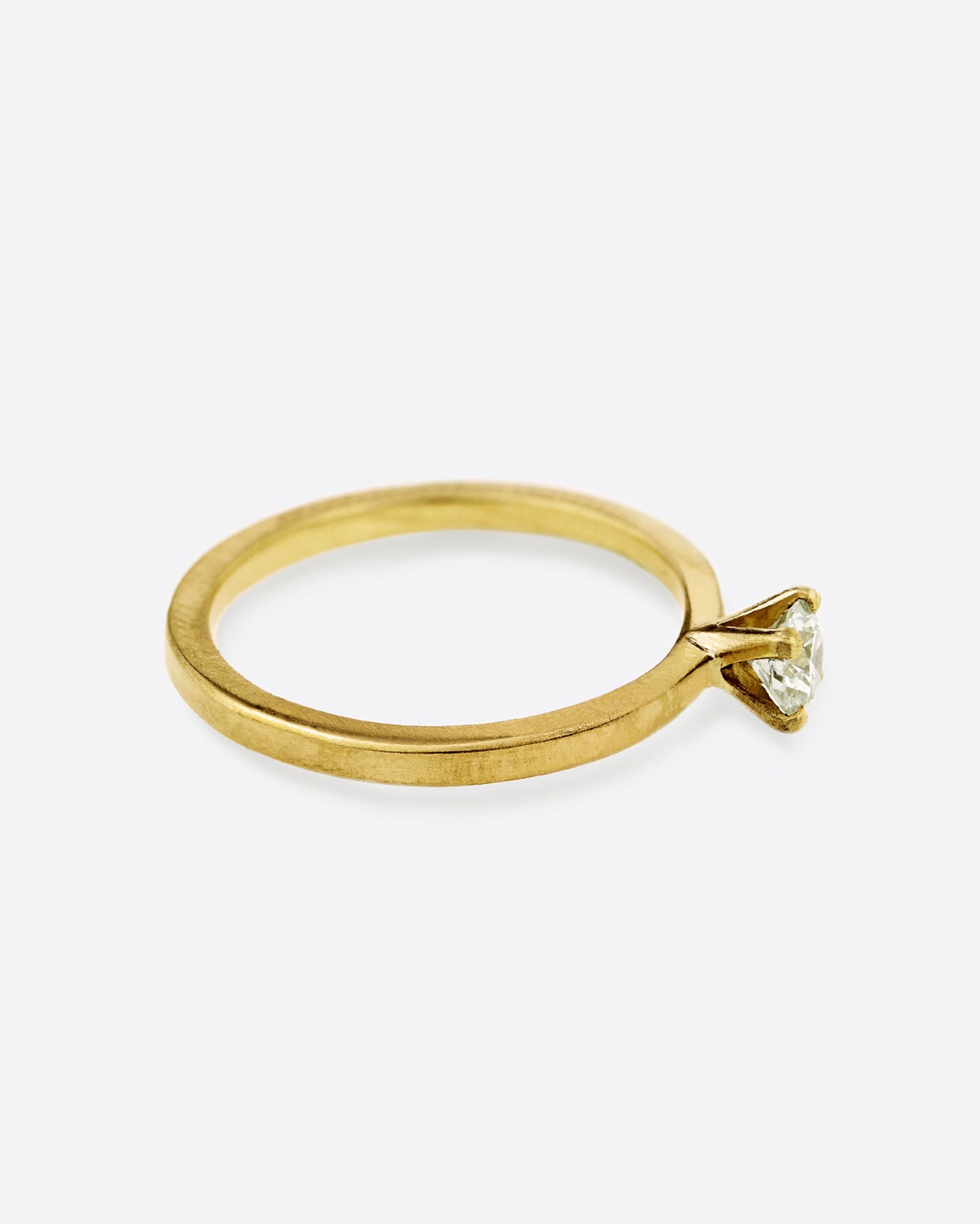 18k fairmined gold ring with white diamond