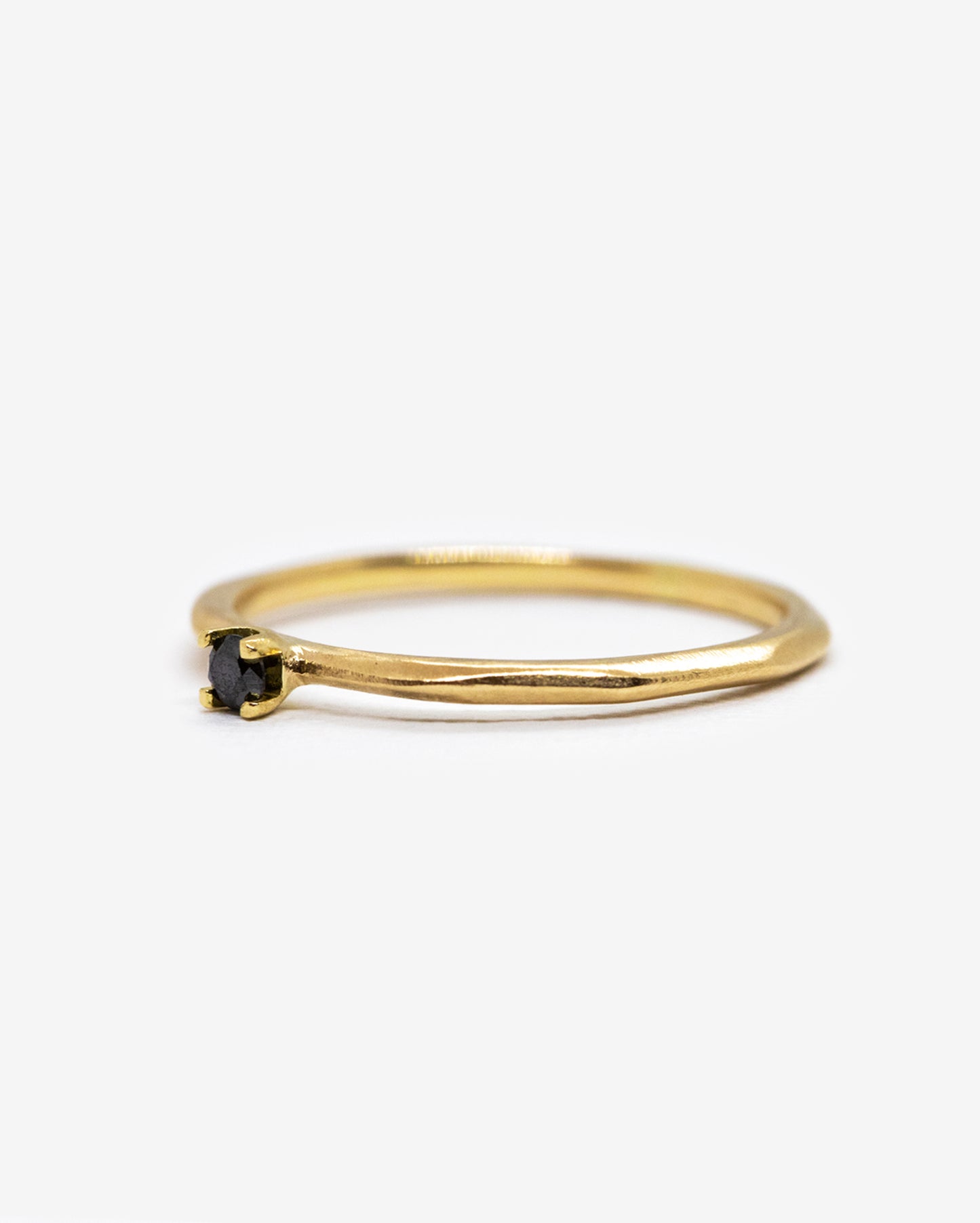 18k fairmined gold Kaviar ring with small black diamond