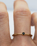 18k fairmined gold fine Rock ring with small black diamond