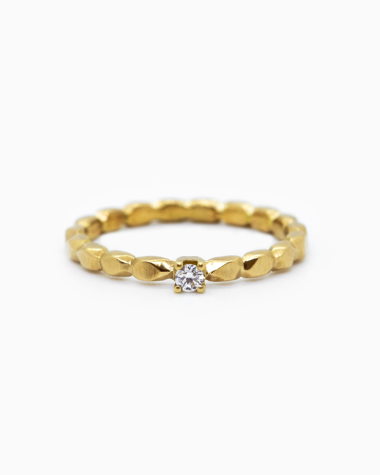 18k fairmined gold Refined ring with small white diamond
