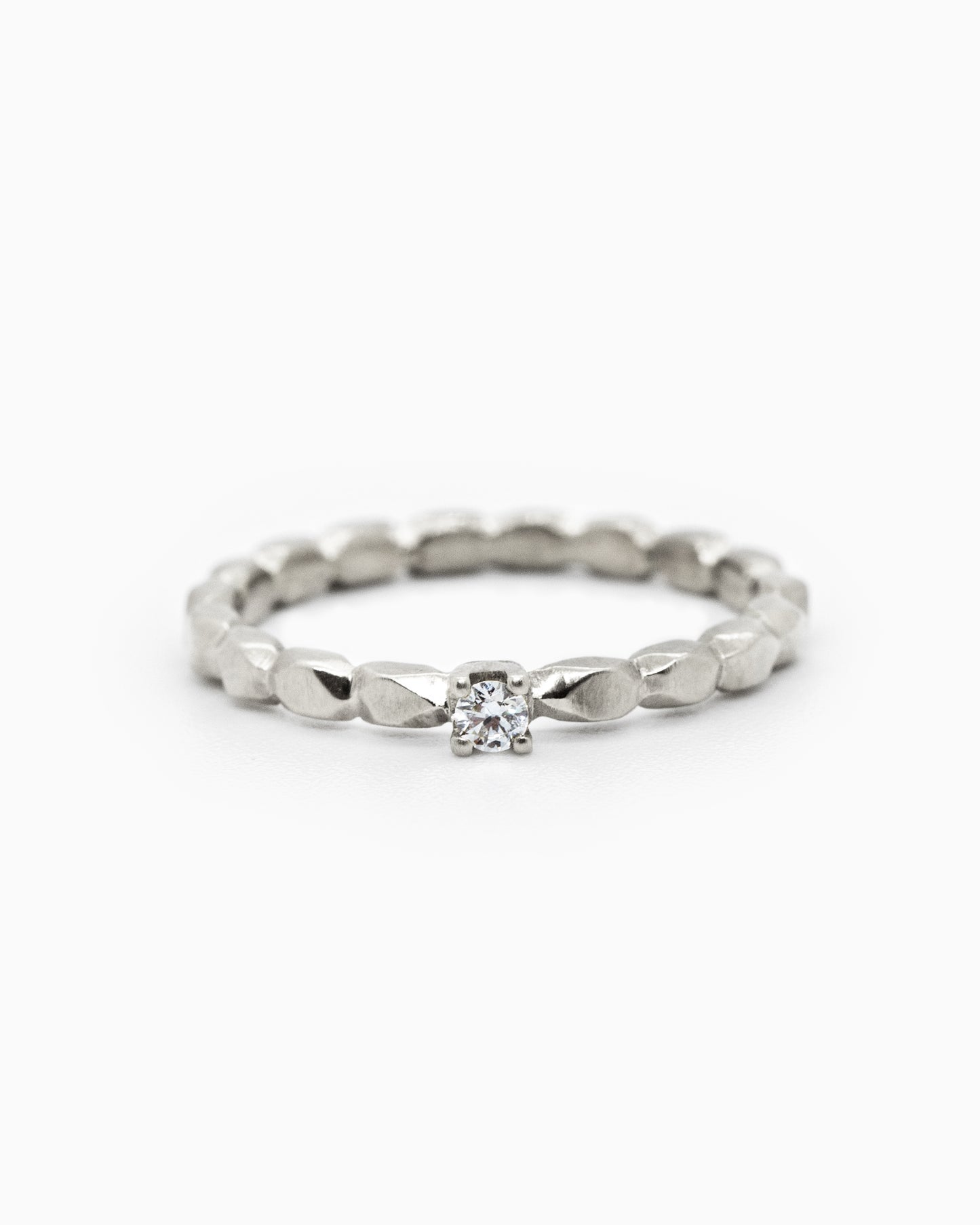 18k fairmined white gold Refined ring with small white diamond