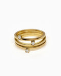 18k fairmined gold ring featuring a delicate white diamond